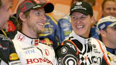 Michael Schumacher and Jenson Button