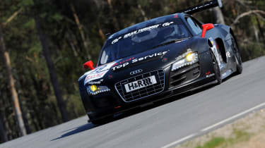 evo races an Audi R8 LMS at the Nurburgring 24 hours