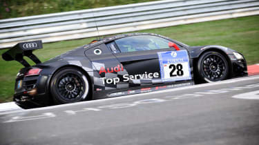 evo races Audi R8 LMS at the Nurburgring