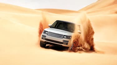 2013 Range Rover silver L405 driving on sand dunes