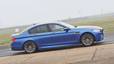 BMW M5 blue, on track action