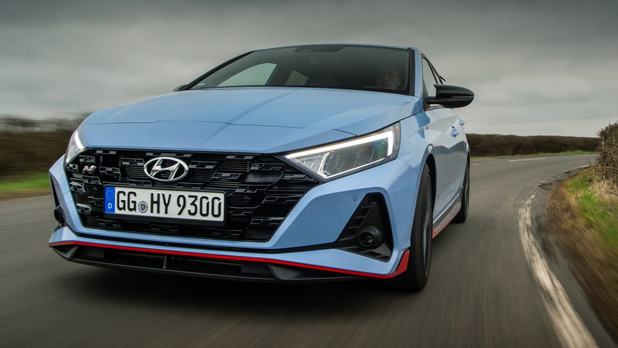 Hyundai i20 N on a winding mountain road, demonstrating its agile handling and compact proportions
