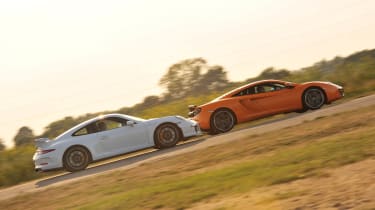 evo track times - Porsche 911 GT3 vs McLaren 12C