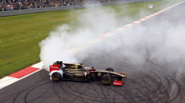 Lotus F1 car doing a burnout