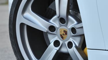 2013 Porsche Cayman S white front alloy wheel