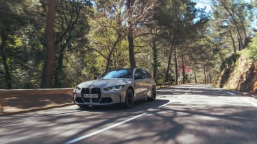 BMW M3 Competition Touring – on road front quarter