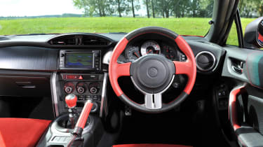 Toyota GT86 interior dashboard steering wheel black red