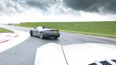 Mercedes SLS AMG Roadster vs Aston Martin DBS Volante evo track battle