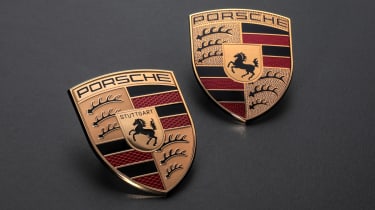 Old and new Porsche logos
