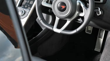 McLaren MP4-12C vs Ferrari F40 McLaren steering wheel