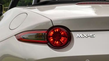 MX5 header