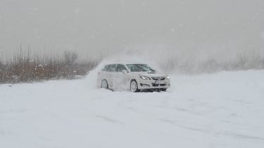 Subaru Legacy in snow