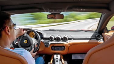 Ferrari F12 Berlinetta interior driving shot