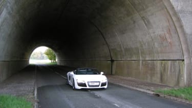 Audi R8 Spyder in front of tunnel