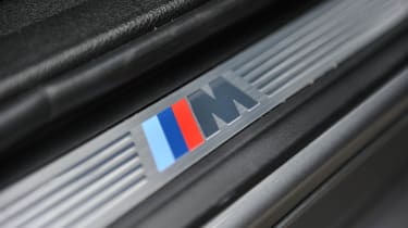 BMW X3 xDrive35d kick plate M badge