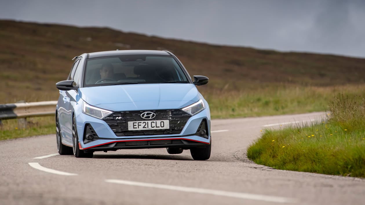 Hyundai i20 N cornering hard on track during evo Car of the Year 2021 testing, showing excellent body control and grip