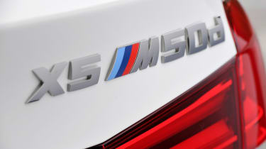 BMW X5 M50d rear badge