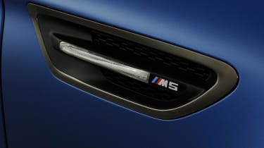 New BMW M5 M Performance Edition black M badge vent