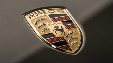Porsche Mission X reveal studio badge