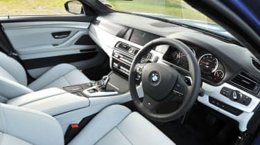 BMW M5 interior with cream leather seats