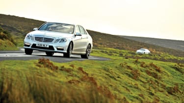 Mercedes E63 AMG silver, front cornering