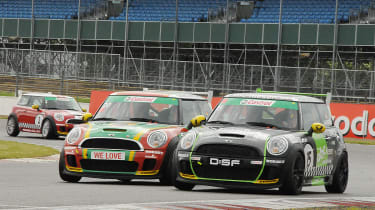 Track action at Mini United