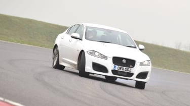 Jaguar XFR white, drifting on track
