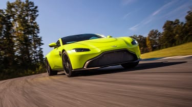 evo exclusive Aston Martin Vantage - green driving front quarter
