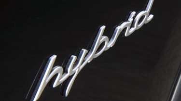 Porsche Cayenne Hybrid badge