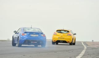 Subaru BRZ coupe and Renaultsport Megane 265 Trophy on track
